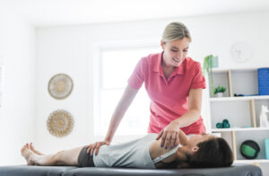 Chiropractic care being given as part of corporate wellbeing initiatives at work.
